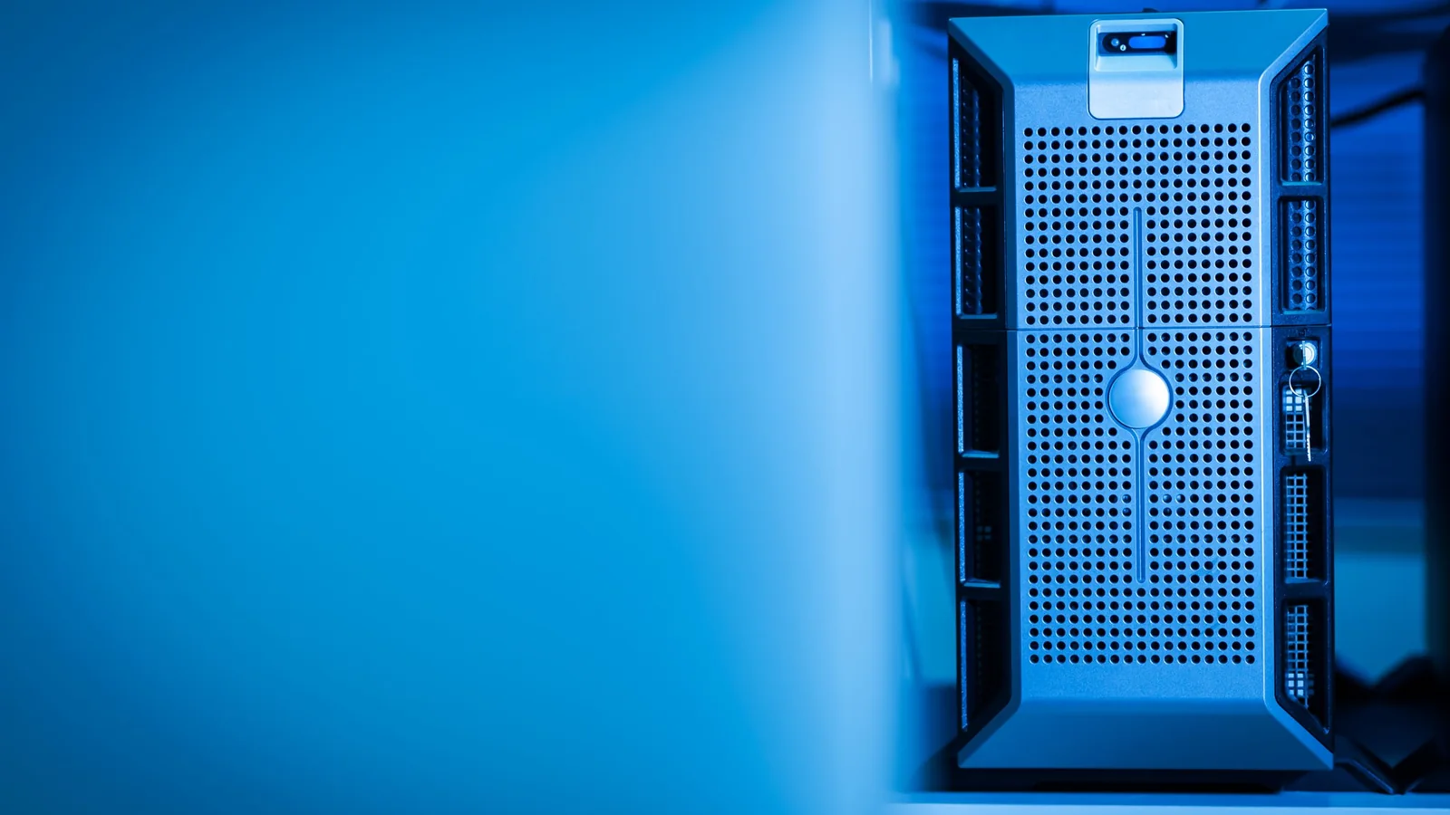 Server unit lit in blue inside a data center